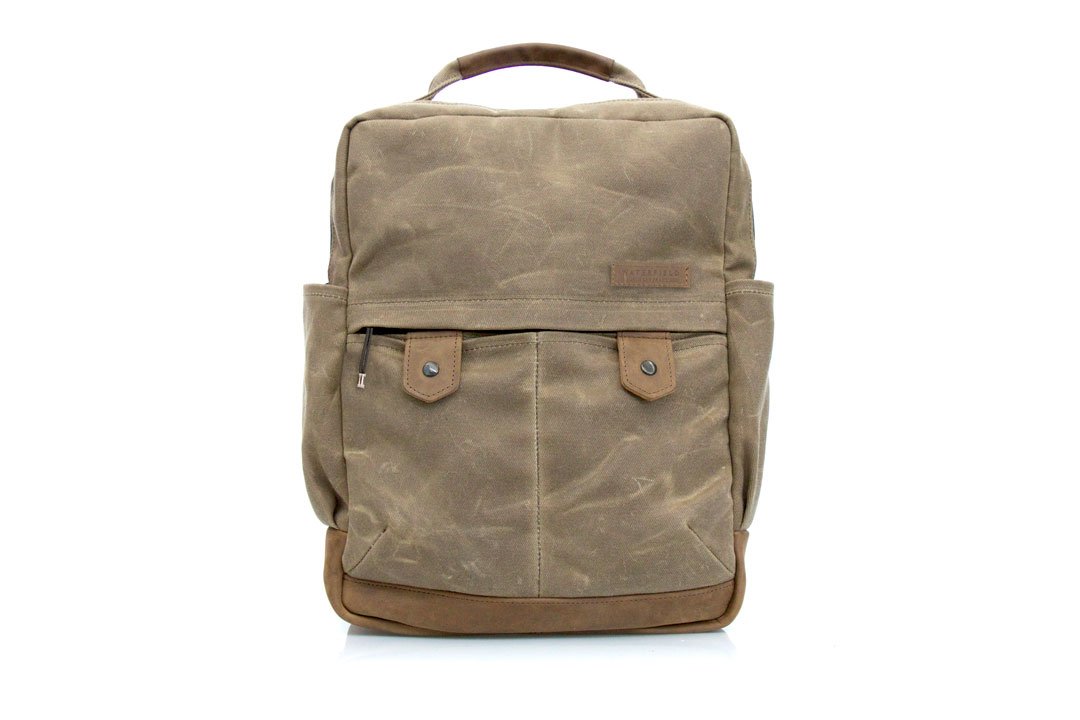 Sturdy full-grain leather bottom. Plenty of organizational pockets.