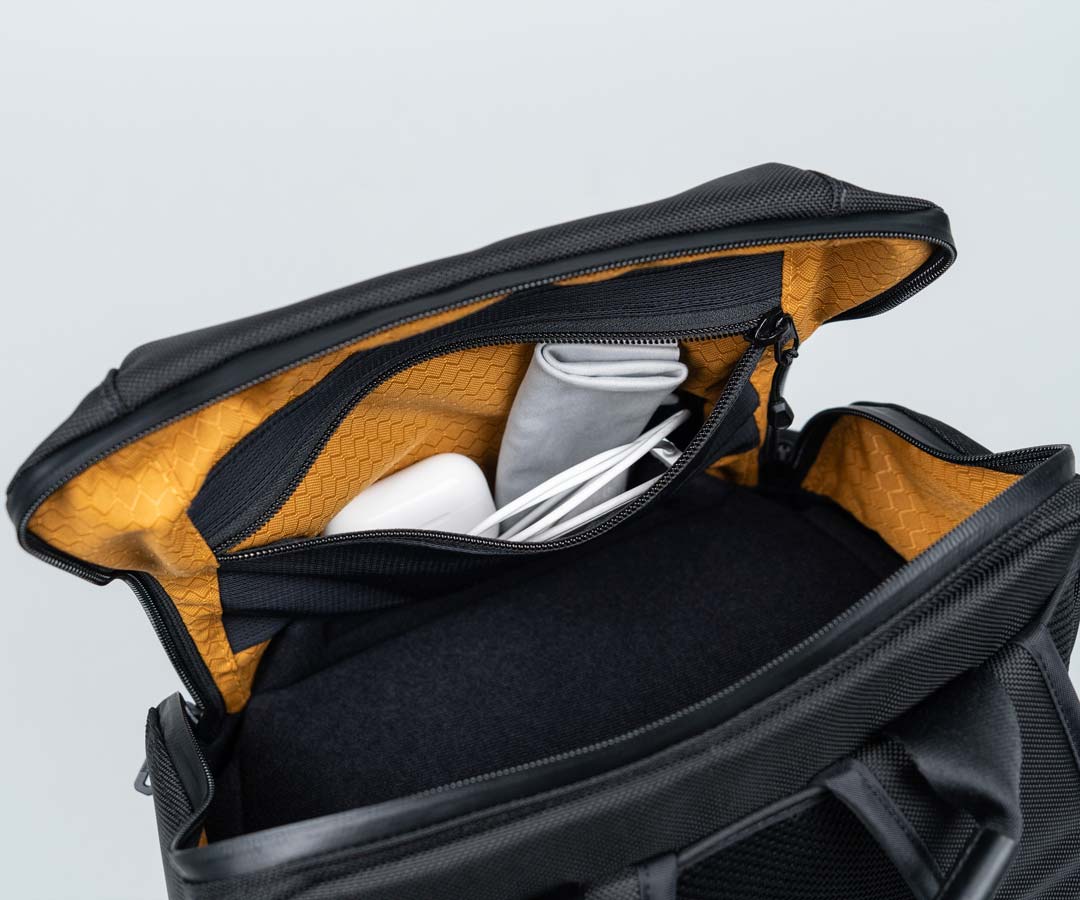 Zipped side pocket secures loose items