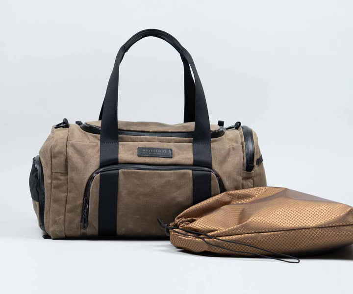 Includes removable water-resistant bag for sweaty clothes