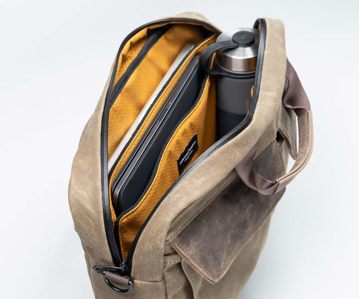 Two padded laptop and tablet pockets