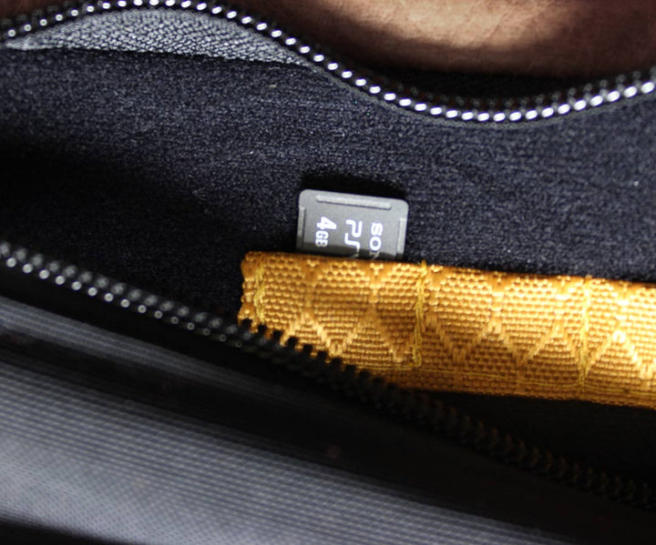 Micro SD card slot in back mesh pocket