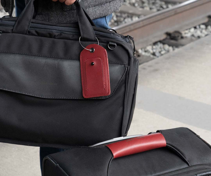 https://www.sfbags.com/cdn/shop/products/Red-Handle-and-Tag_740x.jpg?v=1614969214