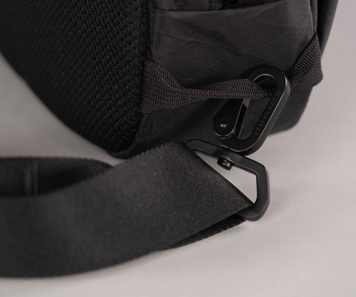 Durable hardware is adjustable for carrying  on right or left shoulders